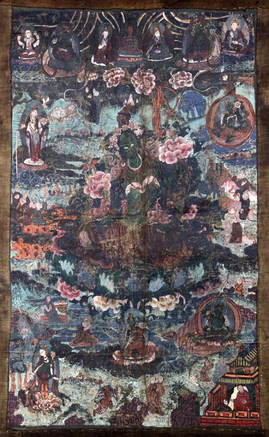 A Tibetan painted silk thangka of Green Tara, early 20th century, 72 x 45cm excl. borders